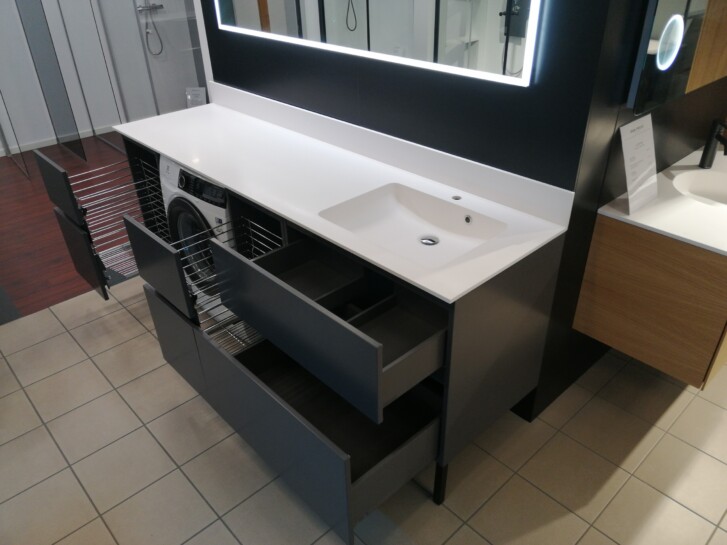 Grada XL bathroom furniture in dark painted finish with Xonyx countertop and integrated washing machine